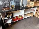 58 · 2 x BLACK GRANITE TOPPED SHOP COUNTERS, EACH 240cm