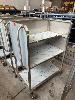 24 · STAINLESS STEEL LINEN TROLLEY ON CASTOR WHEELS,, 1400 (H) x 900 (W) x 600mm (D), 3 x SHELVES, , **SUBJECT TO INSURANCE CLAIM, BUYER TO INSPECT** NO GST