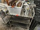 279 · STAINLESS STEEL TROLLEY ON CASTORS, 850 (L) x 500 (W) x 800mm (H), WITH 3 x SHELVES