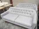 1 · 2 X MATCHING 2-SEAT BUTTON FABRIC SOFAS. WOODEN LEGS, LIGHT GREY.