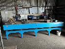 44 · LARGE CAST IRON SURFACE TABLE, 3820 x 1370mm ON 10 LEG STAND SURFACE IN GOOD CONDITION