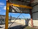 293 · SWING ARM CRANE 500 KG 5.5 MTR ARM WITH 4.5 MTR SWIVEL POST, PENDANT CONTROL . POWERED TRAVEL , ANCHOR CHAIN HOIST .