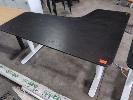 144 · ELECTRIC HEIGHT ADJUSTABLE CORNER DESK (IKEA BEKANT). LHS RETURN. BLACK WOODGRAIN LAMINATE TOP, WHITE LEGS. 1,600 X 1,000 MM OVERALL.
