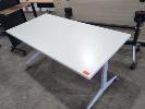 146 · MOBILE FLIP TOP DESK. WHITE LAMINATE TOP, GREY BEIGE METAL FRAME. 1,500 X 750 X 750 MM (W D H).