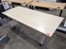 147 · MOBILE FLIP TOP DESK. WHITE OAK WOODGRAIN LAMINATE TOP, BLACK & POLISHED STEEL FRAME. 1,800 X 750 X 730 MM (W D H)