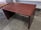 174 · SOLID TIMBER WRITING DESK. DEEP RED BROWN POLISHED WOODGRAIN ON ALL SURFACES. ALL EXTERNAL EDGES QUARTER ROUND. 1,200 X 700 X 725 MM (W D H) NO GST