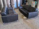 179 · 2 X 3-SEAT SOFAS, LEATHERWORLD. BLACK LEATHER, TRACK ARMS & SQUARE STEEL LEGS. 2,130 X 940 X 750 (W D H).