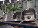 251 · 1 X STAINLESS STEEL TWIN BOWL SINK. WITH FITTINGS. 1,180 X 480 MM., ** AS NEW **