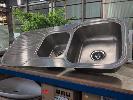 253 · 1 X STAINLESS STEEL TWIN BOWL SINK. WITH FITTINGS. 1,180 X 480 MM., ** AS NEW **