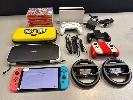 417 · NINTENDO SWITCH OLED GAMING CONSOLE, MODEL HEG-001 WITH, JOY-CON CONTROLLERS, COMFORT GRIPS, JOY-CON WHEELS, AFTERGLOW WAVE WIRELESS CONTROLLER, CASES WITH 9 x ASST GAMES NO GST