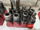 12 X Bt50 Tool Holders With Assorted Tooling Including Plastic Stands