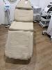 100 · DSSE LATTE VINYL UPHOLSTERED TREATMENT BED, ELECTRONIC, ADJUSTABLE, 240V, SINGLE PHASE