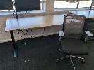 3 · ELECTRIC HEIGHT ADJUSTABLE OFFICE DESK. OAK WOODGRAIN LAMINATE TOP ON BLACK STEEL FRAME. 1,800 X 750 MM., WITH SPINELLY MESH BACK GAS LIFT OFFICE CHAIR.