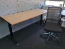 6 · ELECTRIC HEIGHT ADJUSTABLE OFFICE DESK. OAK WOODGRAIN LAMINATE TOP ON BLACK STEEL FRAME. 1,800 X 750 MM., WITH SPINELLY MESH BACK GAS LIFT OFFICE CHAIR.