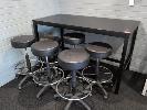 10 · HEAVY DUTY BAR TABLE. BLACK LAMINATE TOP ON BLACK STEEL FRAME. 1,800 X 900 X 1,050 MM (W D H)., WITH 6 X GAS LIFT PADDED OFFICE STOOLS IN BLACK