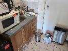 11 · CONTENTS KITCHEN CABINETS. INCLUDES PANASONIC MICROWAVE, KETTLE, 2 X TOASTERS, SANDWICH MAKER, BINS & CONSUMABLES.