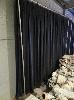 39 · 1 X FREE STANDING ACOUSTIC CURTAIN/BACKDROP. JANDS 5,000 x 3,600 MM (DROP) SCHOOL WOOL, 571 GSM FIRE RETARDANT, BLACK, ALLOY FRAME WITH 2 X HEAVY STEEL PLATE BASES.