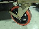 4 X ISO SHIPPING CONTAINER CASTOR WHEELS. SINGLE WHEEL, SWIVEL LOCKING TYPE.
