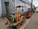 27 · AMUSEMENT TRAIN RIDE, ELECTRIC, COMPRISING OF, STEAM ENGINE, 2 SEATER,, ENCLOSED CARRIAGE, 8 SEATER &, OPEN CARRIAGE, 8 SEATER, FIBREGLASS MOULDED EXTERIOR ON SOLID STEEL FRAME, (MADE TO RUN ON MINI TRAIN TRACKS, NOT INCLUDED) NO GST