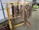 111 · 6 x ASSORTED LIFTING CHAINS, 3 x LENGTHS OF CHAIN & CHAIN RACK