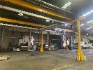 57 · PARTS PICKING WORKSHOP OVER HEAD CRANE, DISMANTLED, WITH 2 x KNIGHT INDUSTRIES 150kg ROTATING PARTS PICKERS., UPRIGHT SUPPORTS & HORIZONTAL BEAMS NUMBERED FOR REASSEMBLY, OVERALL SIZE 25 x 7.9m