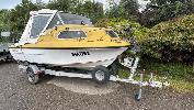 46 · FIBREGLASS FISHING BOAT, SEAFARER, 5m, HALF CABIN WITH YAMAHA OUTBOARD MOTOR, 70HP, REG: HM176S, HIN # AUTSA033228CXP, ON, GALVANISED STEEL SINGLE AXLE BOAT TRAILER, REG; YAR 244