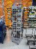 83 · LARGE QTY OF GLASS & SUNGLASSES, WITH ROTATING GLASSES RACK