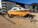 SUNDOWNER HALF CABIN BOAT, 19' FIBREGLASS, POWERED BY 110HP JOHNSON OUTBOARD, 78 HOURS INDICATED, WITH FUEL TANK, CUSTOM BAIT BOARD, BIMINI & GAUGES, HIN: AU-TSA053131AHI, REG: FX175, SINGLE AXLE TRAILER, REG: TUZ 018, WITH ELECTRIC WINCH NO GST