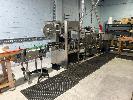 Auto Bottle Shrink Wrap Label Line, Comprising, Infeed Conveyor, Auto Sleeve Labeller, Conveyor To - Steam Heat Shrink Tunnel, Conveyor To - Bottle Turn Table & Timber Pallet Benching, All Stainless Steel Cased, 415v Power (Buyer To Disconnect & Remove)