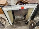 87 · ORNATE CAST FIREPLACE INSERT