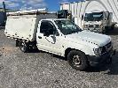 132 · 2003 TOYOTA HILUX RZN149R 140 SERIES SINGLE CAB, ENCLOSED TRADIES UTE, REG: XHE 582, VIN: JTFAM426700125456, ENG: 3R23021223, ODO: 450,737ksm SHOWING, 4 CYLINDER EFI, 2.7 LITRE, AUTOMATIC TRANSMISSION, WHITE DUCO, 2 DOORS, 3 SEAT,, AIR CON, CD PLAYER, POWER STEERING, SPARE WHEEL, TOW BAR, FULLY ENCLOSED BACK, 3 DOOR GAS LIFT LOCKABLE, WITH ROOF RACK, , KEY #36, (WITH PAPERS, WITH 2 KEY/S, WITH OWNER'S MANUAL) 11.00% PREMIUM