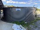 9 · TANK 9, PIONEER WATER TANKS COLORBOND CORRUGATED SLATE GREY WATER TANK, APPROXIMATELY 75,000 LITRE CAPACITY, APPROXIMATE SIZE 1.7 METRE HIGH x 7.5 METRE DIAMETER, WITH ACCESS LADDER