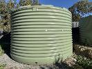 12 · TANK 12, POLY WATER TANK OLIVE GREEN, APPROXIMATELY 25,000 LITRE CAPACITY, APPROXIMATE SIZE 2.3 METRE HIGH x 3.8 METRE DIAMETER