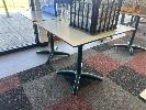 19 · PAIR OF CAFE TABLES, WHITE TOP, BLACK EDGE, GREEN STEEL PEDESTAL BASE, 800 x 800 x 735mm (H)