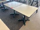 21 · PAIR OF CAFE TABLES, WHITE TOP, BLACK EDGE, GREEN STEEL PEDESTAL BASE, 800 x 800 x 735mm (H)