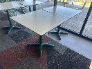 25 · PAIR OF CAFE TABLES, WHITE TOP, BLACK EDGE, GREEN STEEL PEDESTAL BASE, 800 x 800 x 735mm (H)