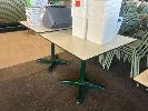27 · PAIR OF CAFE TABLES, WHITE TOP, BLACK EDGE, GREEN STEEL PEDESTAL BASE, 800 x 800 x 735mm (H)