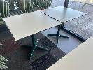 28 · PAIR OF CAFE TABLES, WHITE TOP, BLACK EDGE, GREEN STEEL PEDESTAL BASE, 800 x 800 x 735mm (H)