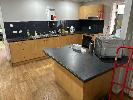 75 · COMPLETE KITCHEN INCLUDING, L SHAPED COUNTER 3800 x 1400mm WITH TWIN BOWL SINK, WESTING HOUSE FRIDGE/ FREEZER, HOTPLATES ELECTRONIC, OVER HEAD CUPBOARDS WITH BUILT IN EXHAUST CANOPY, + SEPERATE L SHAPED CUPBOARD 2000 x 1430mm